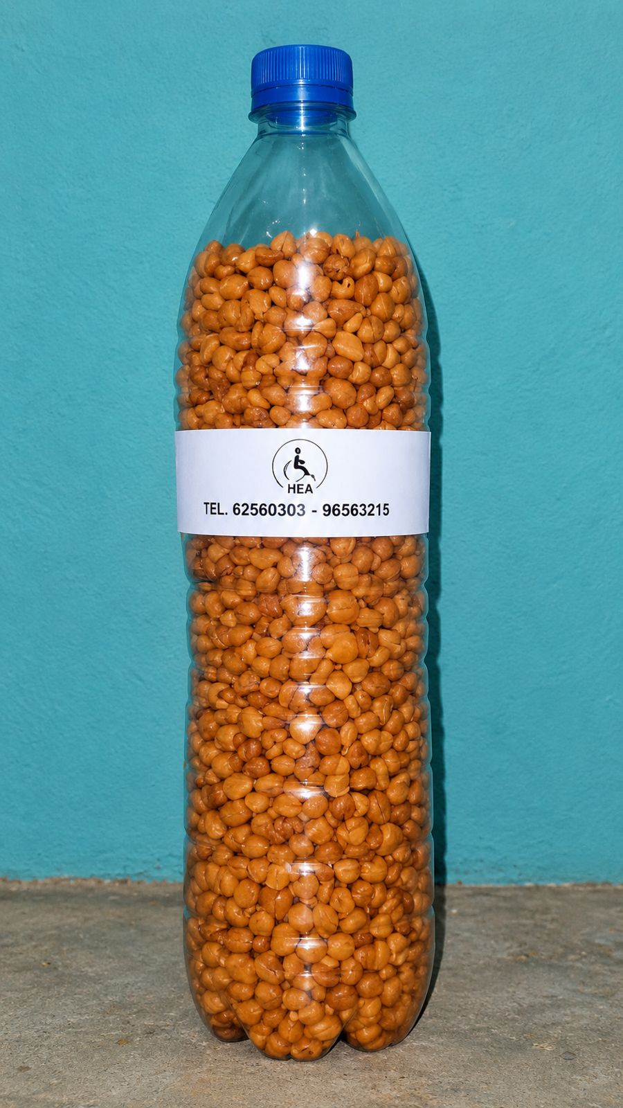 Bouteille d'arachides grillées étiquetée HEA
